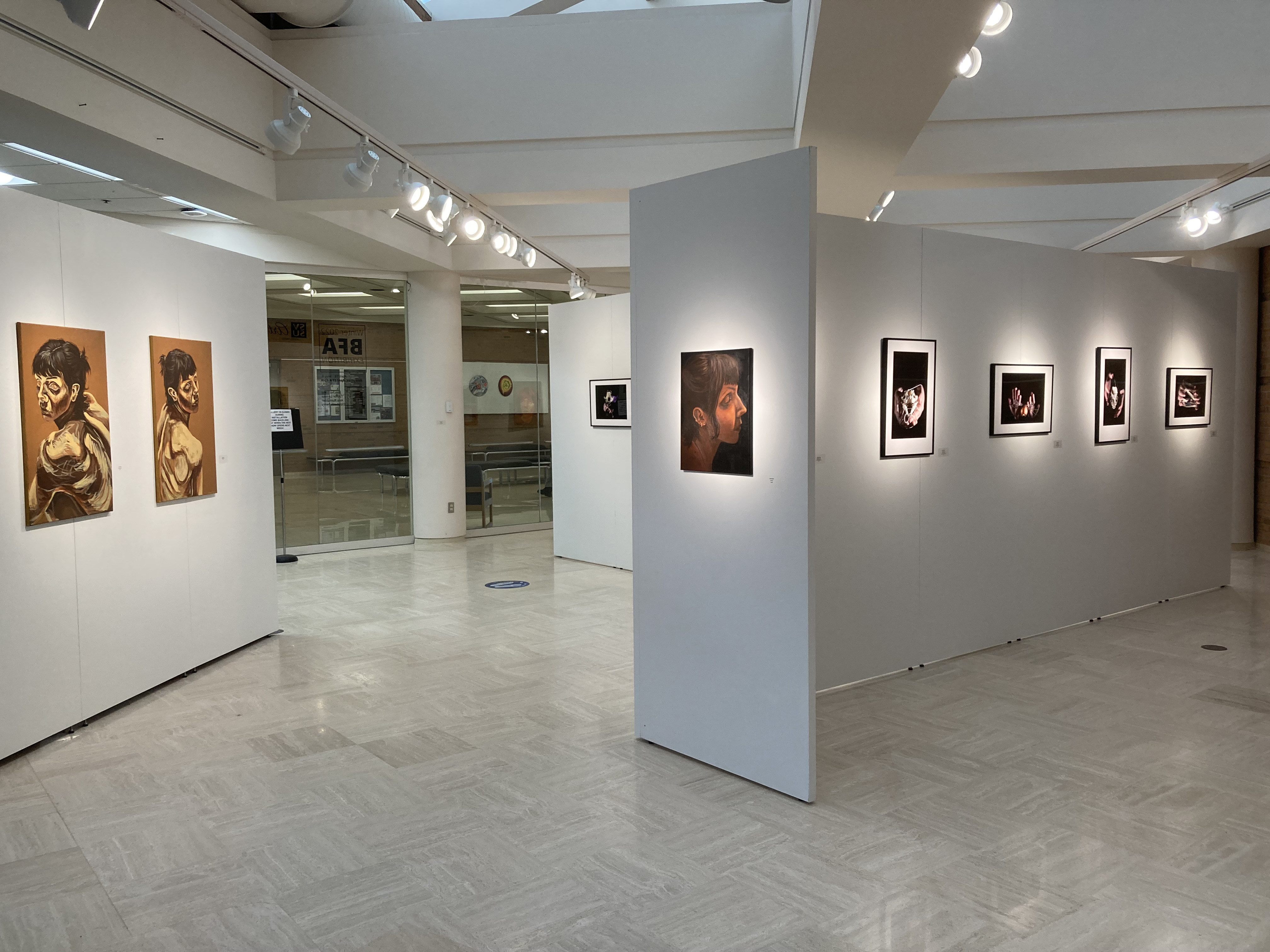 Looking north toward entrance interchange of Lemke paintings and Terry photos